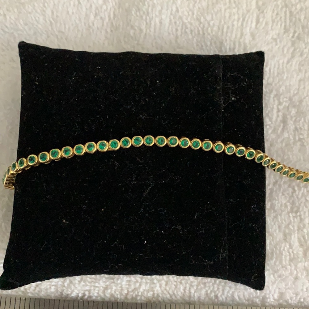 Sterling silver bracelet gold tone with red stone